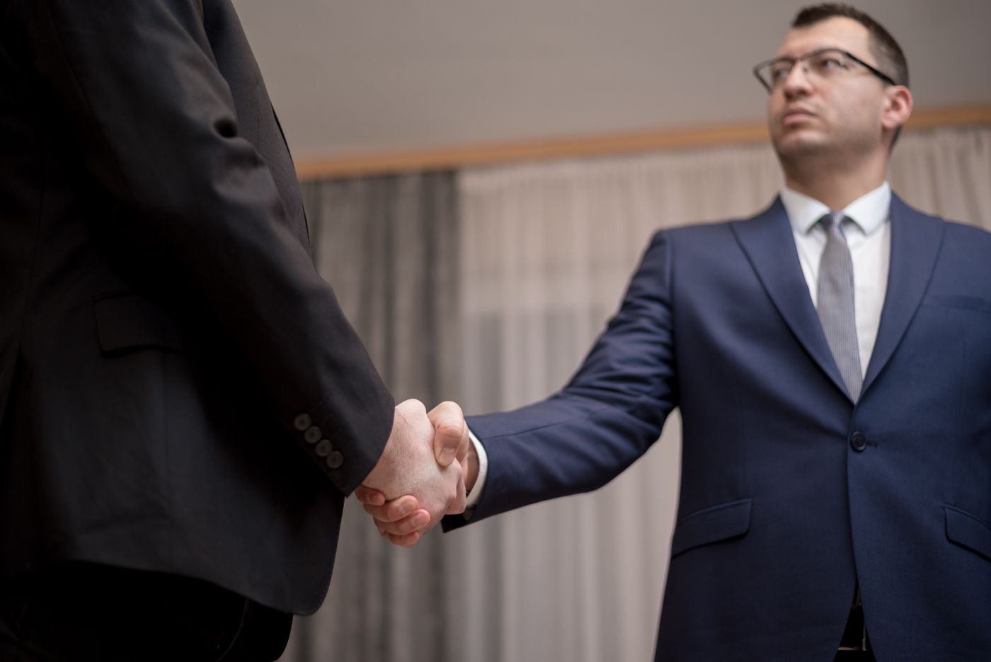Business partners concluding a trade agreement