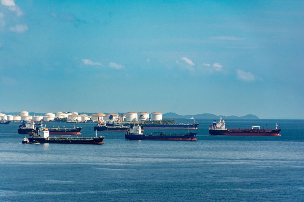 Tankers at anchorage near a marine tank farm
